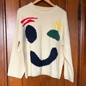 Artistic Cream Sweater with Abstract Design